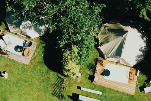  Boutique camping Whanau, verwarmde tenten, Unterkunft in Rutten