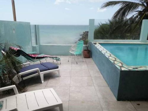 Casa Rosa 2 bedroom beach fronted home with private pool in Chelem, Mexico