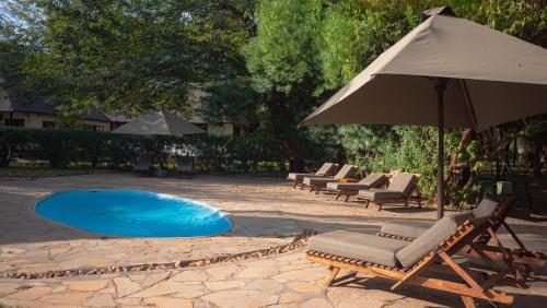 Piscina, Kiambi Safaris Lodge in Mafuta