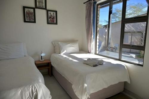 the Farmhouse Restaurant Guesthouse Beergarden PTY LTD in Outjo