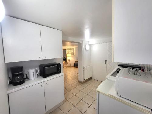 J1 St-Quentin-en -Yvelines Studio en Rez de jardin avec parking in Траппе