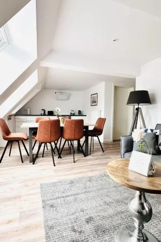 Apartments am Wellenreiter - Küstenzuflucht in Tating, Deutschland