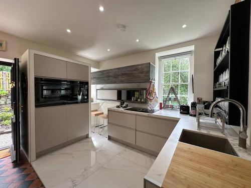 Bridge Cottage Upper Malone in เขตมอเตอร์เวย์