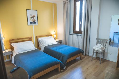Casa Garo' Room Type - Twin Room with Shared Bathroom