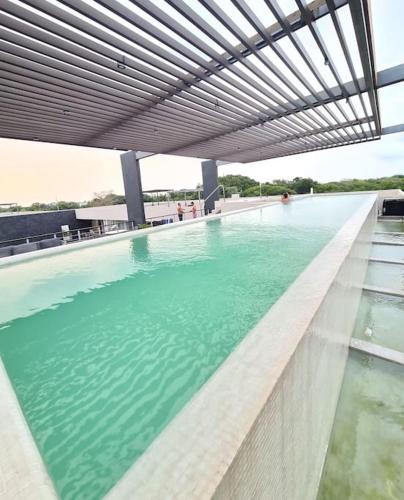 Playacar, 2 recámaras PH 317, Bamoa Residencial in Playa del Carmen, Mexico