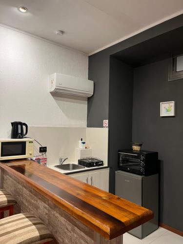 ห้องครัว, Departamento moderno y con excepcional vista a la montaña (Departamento moderno y con excepcional vista a la montana) in บียานวยบา