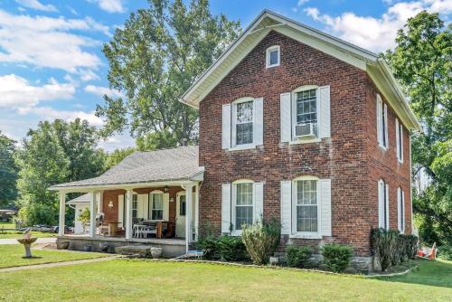 The Red Brick Homestead in Angola-on-the-Lake, USA