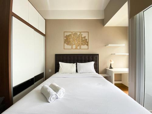Warm and Cozy Studio at Vasanta Innopark Apartment By Travelio, Cikarang