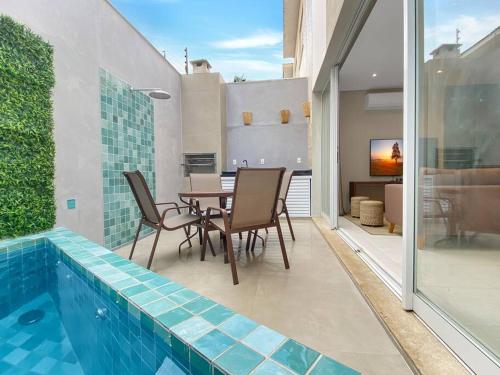 Piscina Privativa - Churrasqueira - 4 Quartos - Condominio – khách sạn tại Vila Julia