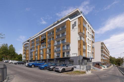Vista Exterior, Stylowy Apartament z Dwiema Sypialniami Balkonem i Parkingiem by Noclegi Renters in Welnowiec