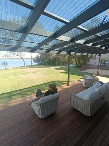 Waterfront Oasis Lakefront Villa with Pool and Sauna in Lake Munmorah