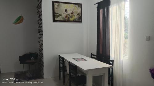 Andalus Cottage in ตุมปัต