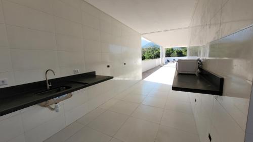 Konyha, Suítes privativas com Ar, Frigobar e TV - apenas 300m da Praia da Maranduba (Suites privativas com Ar, Frigobar e TV - apenas 300m da Praia da Maranduba) in Praia da Maranduba