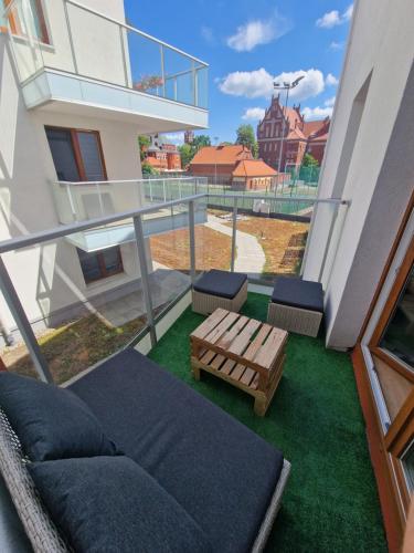 Балкон, Apartament w Centrum z wanną z hydromasażem (Apartament w Centrum z wanna z hydromasazem) in Кентшин