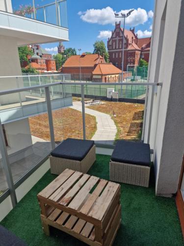 Балкон, Apartament w Centrum z wanną z hydromasażem (Apartament w Centrum z wanna z hydromasazem) in Кентшин