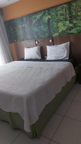 Flat com varanda, quarto de Morador Hotel 1112 in Nova Iguaçu