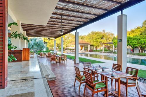 Luxury 3BR Condo with Partial Ocean View - Bougainvillea - Reserva Conchal in Playa Conchal