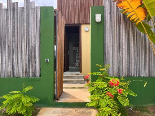 Exterior view, La Maison tropicale by COHO in Assinie-Mafia