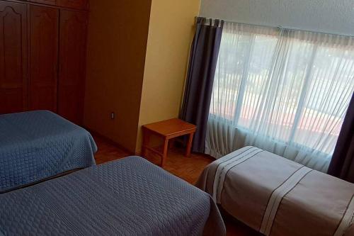 Rumbos Turísticos - casa hasta para 15 personas in Tulancingo, Mexico