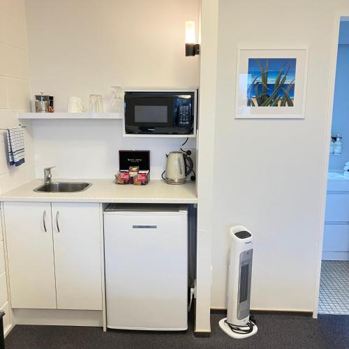 คาปิทิ เกตเวย์โมเต็ล (Kapiti Gateway Motel) in ไวคาเน