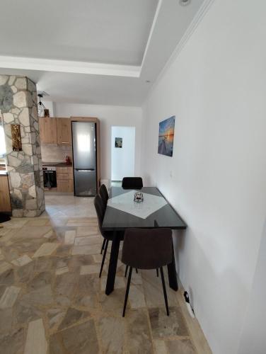 Grey house in Kolona