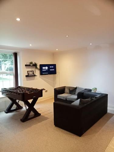 Shared lounge/TV area, Quarrie House in Cramlington Eastfield