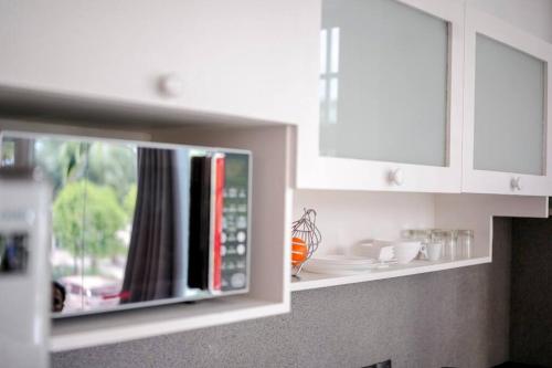 Cozy 1BR apartment by beach - partial ocean view Cozy 1BR apartment by beach - partial ocean view