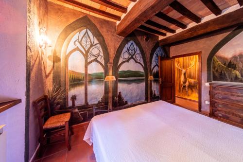 Aradia Casa a Tema Celtico Magico Naturalistico del Casale LaBandita in Кастільйоне дель Лаго