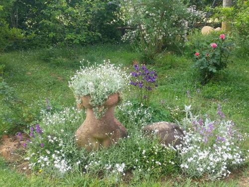 PERGOLA at Le Pietraie a cottage with many flowers