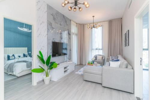 Classy 1BR Midtown Stay Near Miracle Garden by Vibel, Dubaï (photo 6)