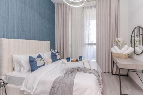 Classy 1BR Midtown Stay Near Miracle Garden by Vibel, Dubaï (photo 8)