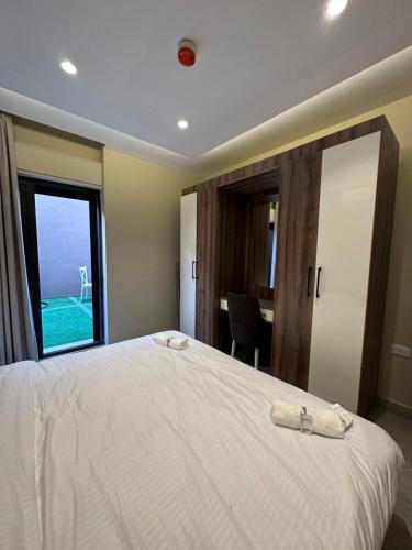 003 AL-NAJEH JRE Apartments For Rent ave - main image