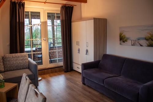 Appartement "Nordseetraum" Achtern Diek 2-21 in Dorum Neufeld, Deutschland