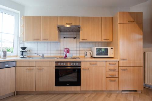 virtuve, Ferienhaus Achteck am Deich, Graureiherweg 4a in Wurster Nordseekuste