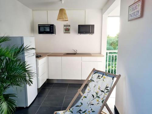 Appartement vue mer avec jacuzzi in Le Diamant