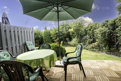 حديقة, Haus Leysand - Ostfriesische Gemütlichkeit (Haus Leysand - Ostfriesische Gemutlichkeit) in Krummhorn