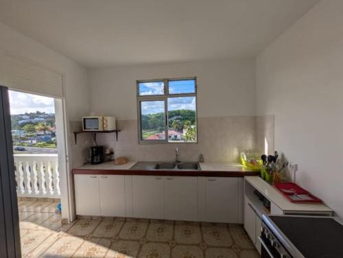 Κουζίνα, Maison F4 à Sainte - Anne, Guadeloupe (Maison F4 a Sainte - Anne, Guadeloupe) in Μάρε Γκαγιάρντ