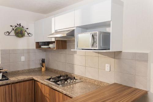 virtuve, Casa con alberca cerca de playas Riviera Nayarit in Fraccionamiento Altavela