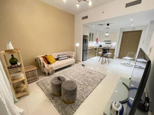 Contemporary 1BR condo with pool at Creek Harbour, Dubai