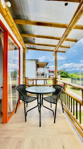 ระเบียง/ชานเรือน, Hotel Campestre La Aldea Cabaña Pijao (Hotel Campestre La Aldea Cabana Pijao) in มอนเตเนโกร