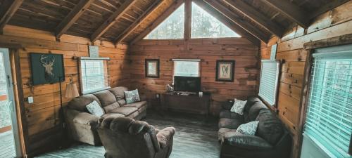 Kozy Haven Log Cabin Rentals - Tap to explore photos