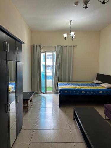 Private room with balcony fully furnished in Dubai Silicon Oasis in Dubai Silicon Oasis