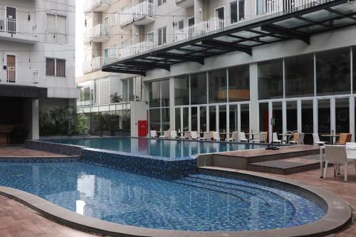 Studio de 27&nbsp;m² en Appartement avec 1&nbsp;salle(s) de bains privée(s) à Tanah Sereal (Dejati Condotel Studio - Bogor Icon) in Tanah Sereal