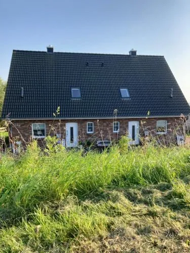 Ferienhaus Momke am Diek Haushälft A in Simonsberg, Deutschland