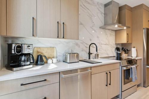 One Riverfront Condo 108 by East West Hospitality in Avon, USA
