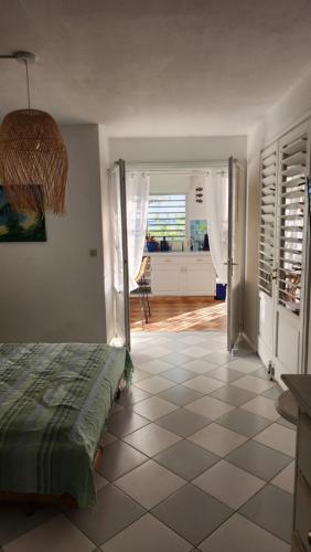 Bamboo on the beach - Spacious beachfront studio, Baie Nettle (fotografie 9)