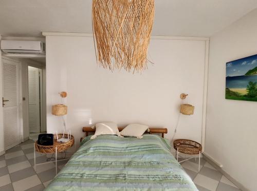 Bamboo on the beach - Spacious beachfront studio, Baie Nettle (fotografie 3)