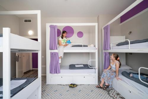 Purple Nest Hostel Room Type - Single Bed in Mixed Dormitory Room with Private Bathroom (8 adults)