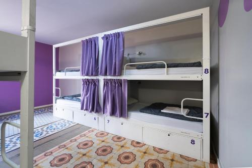 Posto Letto in Dormitorio Misto per 8 Persone

