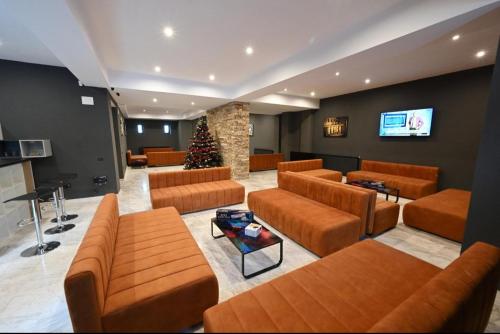 gedeelde lounge/tv-ruimte, R&B Apartment 24 in Predeal